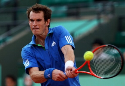Andy Murray of Great Britain hits a backhand during the men's singles round four match between Andy Murray of Great Britain and Victor Troicki of Serbia on day nine of the French Open at Roland Garros on May 30, 2011 in Paris, France.  (Photo by Alex Livesey/Getty Images)