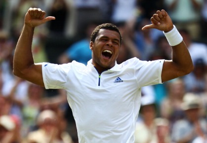 Jo-Wilfried Tsonga of France celebrates after winning his quarterfinal round match against Roger Federer of Switzerland on Day Nine of the Wimbledon Lawn Tennis Championships at the All England Lawn Tennis and Croquet Club on June 29, 2011 in London, England. 