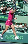 2010 Sony Ericsson Open Miami Justine Henin leap Henk-Abbink