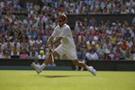 SM 2010 Wimbledon Arnaud CLEMENT leap