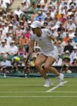 SM 2010 Wimbledon Justine Henin  bent knees