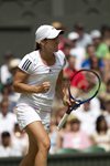 SM 2010 Wimbledon Justine Henin  fist