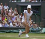 SM 2010 Wimbledon Justine Henin bent ready