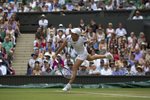 SM 2010 Wimbledon Justine Henin serve end