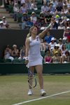 SM 2010 Wimbledon Kim Clijsters serve ball