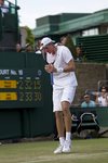 SM 2010 Wimbledon John Isner holds racquet