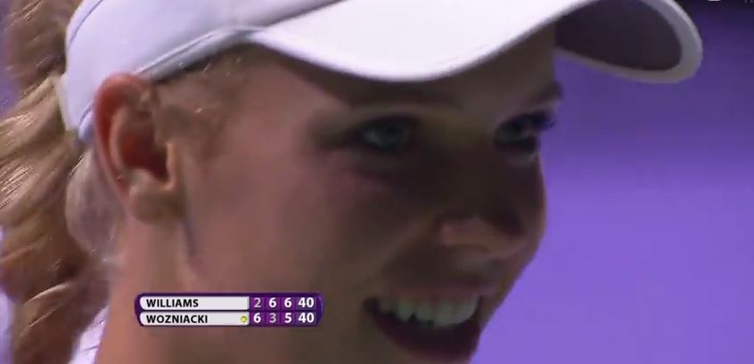 Video: Wozniacki Denies Serena Williams a Match Point then Cracks a Smile 