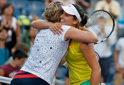 Laura Robson hugs Kim Clijsters after the Belgian retires from the WTA Tour