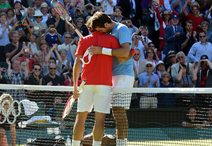 Del potro hugs Federer after marathon Olympic match