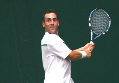Bobby Reynolds of the United States hits a backhand during a match at the 2011 US Open Wildcard Playoffs.