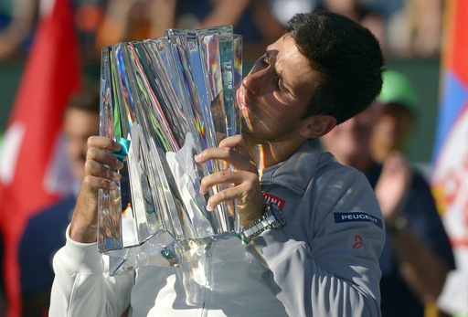 Djokovic Kisses Indian Wells Trophy 2014