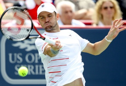 Mardy Fish of the United States returns a shot to Stanislas Wawrinka of Switzlerland during the Rogers Cup at Uniprix Stadium on August 12, 2011 in Montreal, Canada.  (Photo by Matthew Stockman/Getty Images)