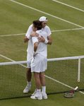 FM_2010 Wimbledon John Isner hugs Nicolas Mahut