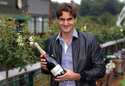 Federer with Champagne after Wimbledon 2012