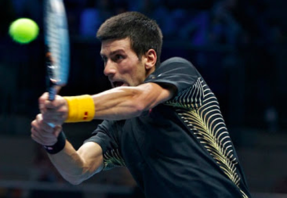 Novak Djokovic wins his Group A match against Andy Murray