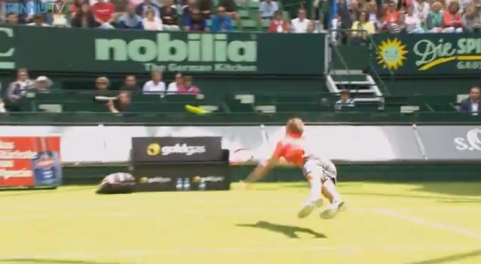 Florian Mayer Takes to the Air like Superman in Halle 