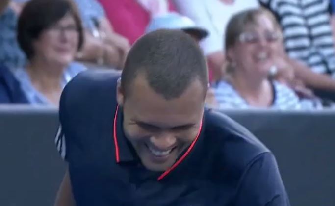 Tsonga tries valiantly to steal a second serve but everybody just laughs and ignores him  