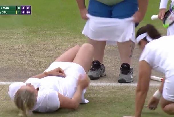 Clijsters Has a Ball with Cross-Dressing Baller at Wimbledon Legend's Doubles  